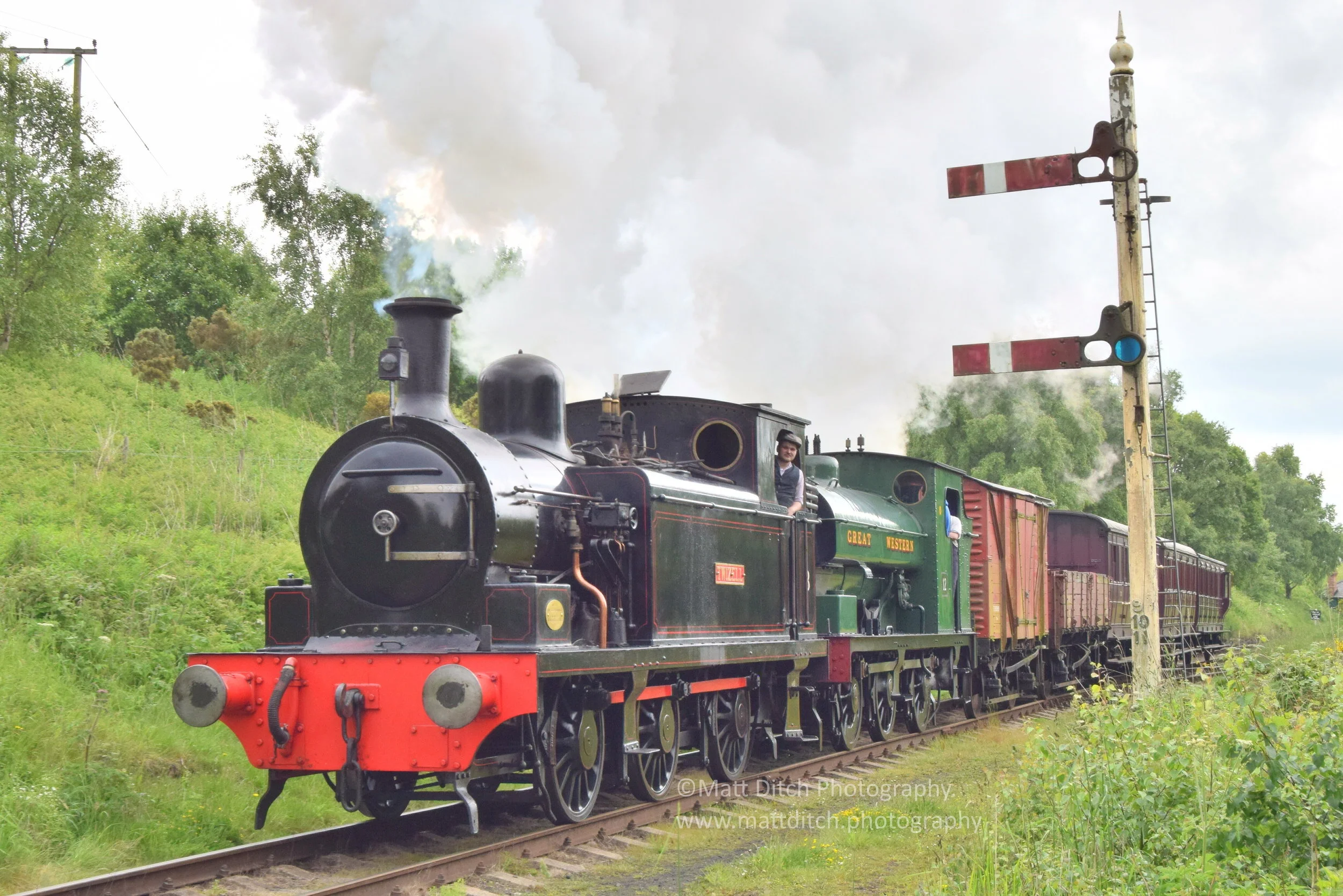  Twizell and No.12 double head a mixed goods train past Terrace junction. 