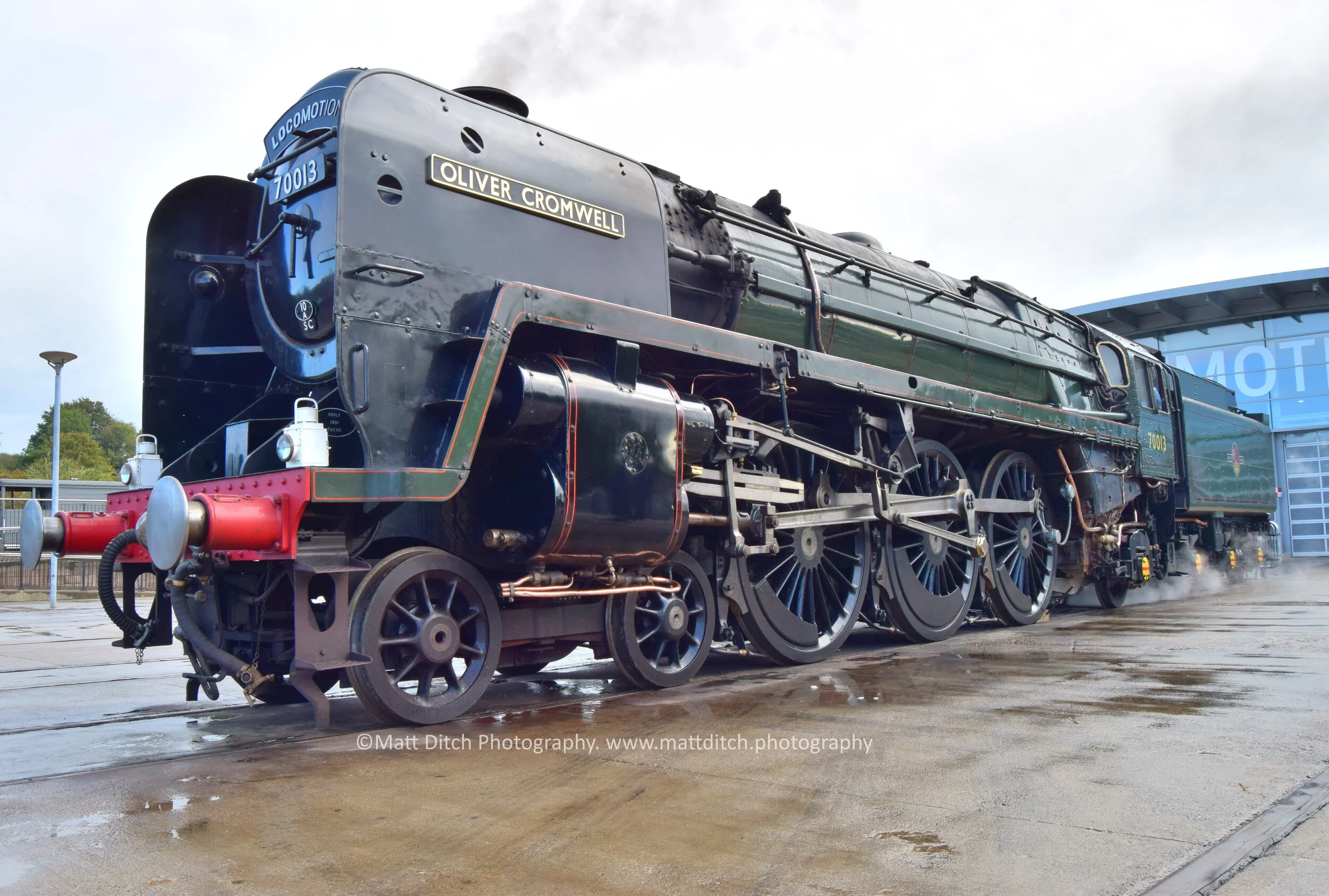  “Oliver Cromwell” in light steam outside the museum building.  