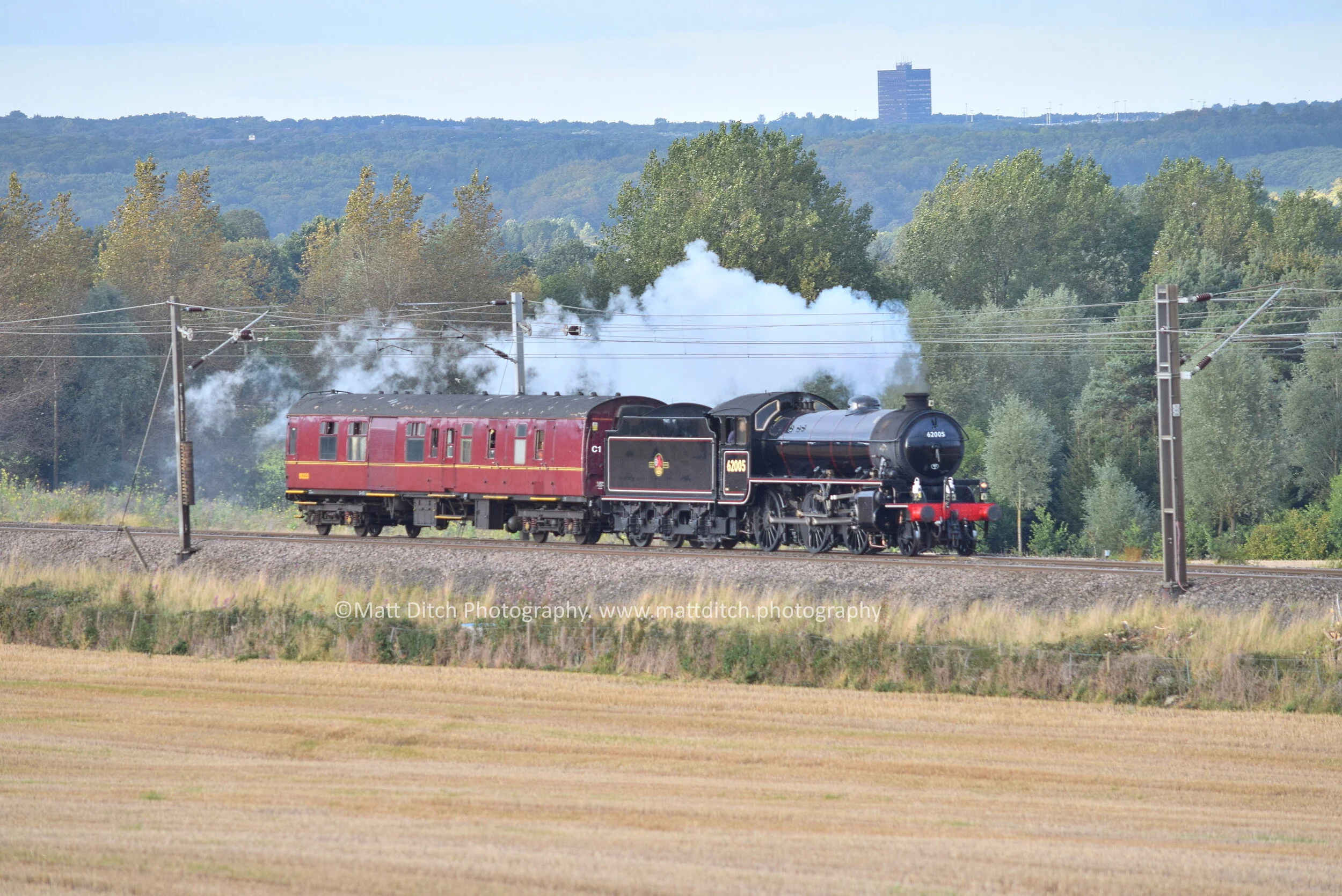  62005 and support coach head south on the ECML bound for Grosmont.  