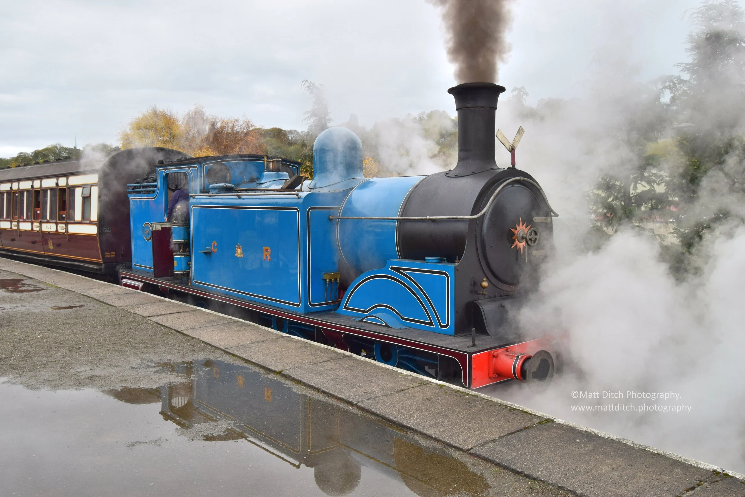  419 prepares to depart with the Caledonian Railway coaches.  