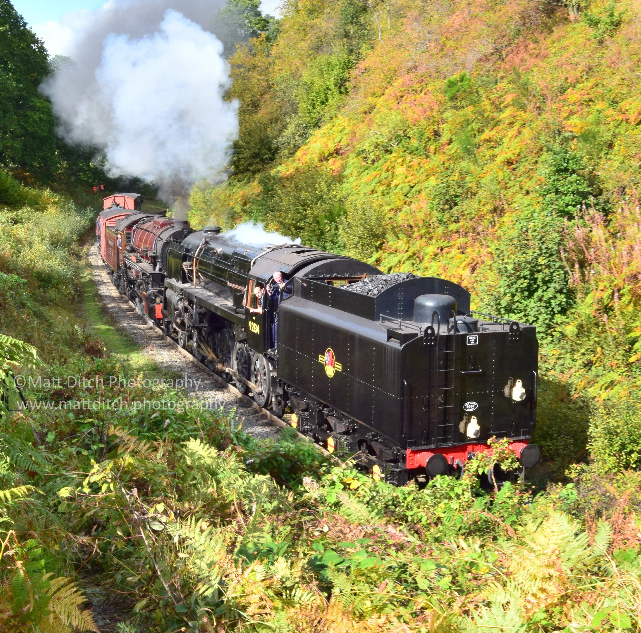  British Rail 9F No.92134 and S160 No.2253 “Omaha”  double head a goods train through Beckhole. 