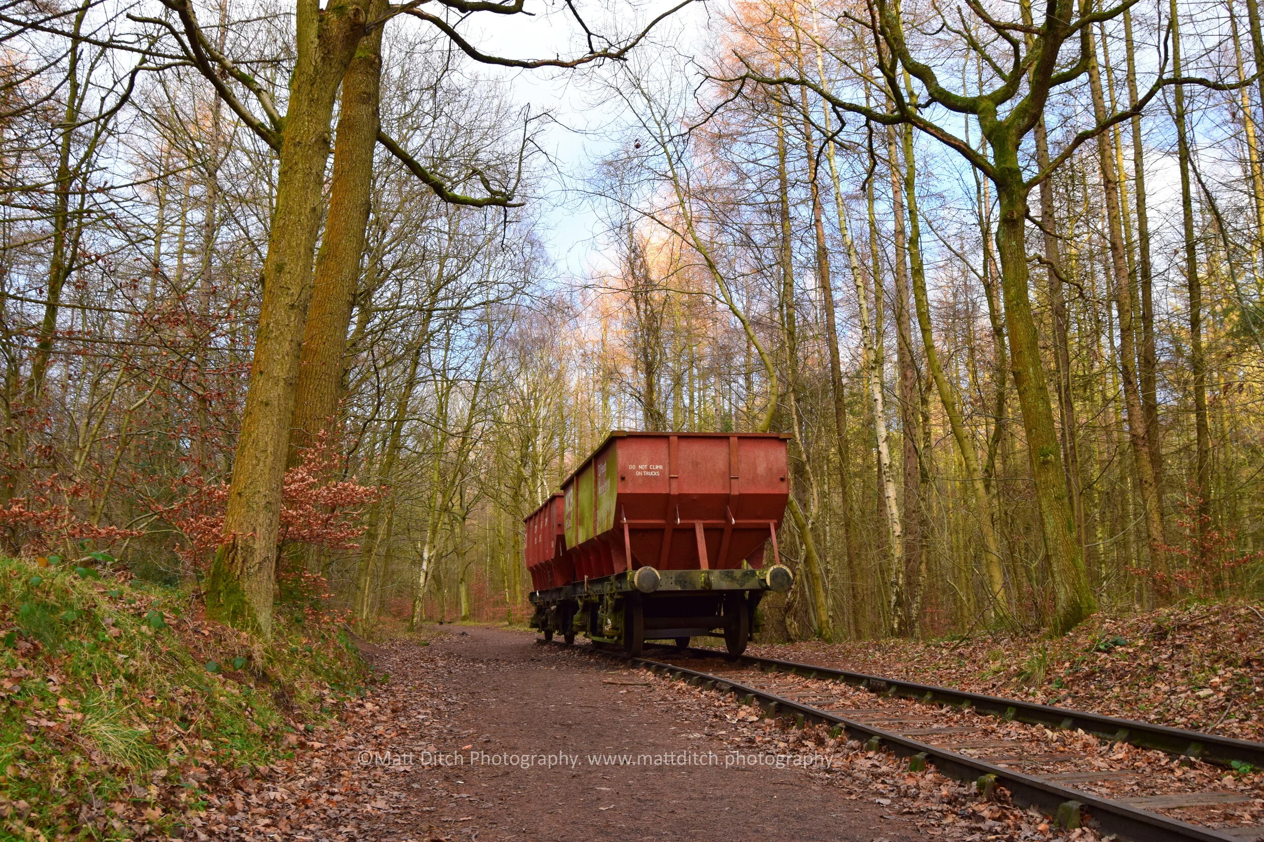  A short section of track has been relayed on the former trackbed and a pair of 21 ton wagons placed on top of it. The wagon closest to the camera is painted in National Coal Board livery and the furthest is painted in Consett Iron Co Livery, to refl