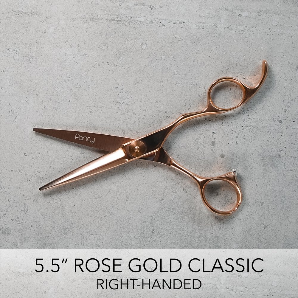 My hair stylist's super fancy scissors have a rotating 3 axis gimbal thumb  ring : r/mildlyinteresting