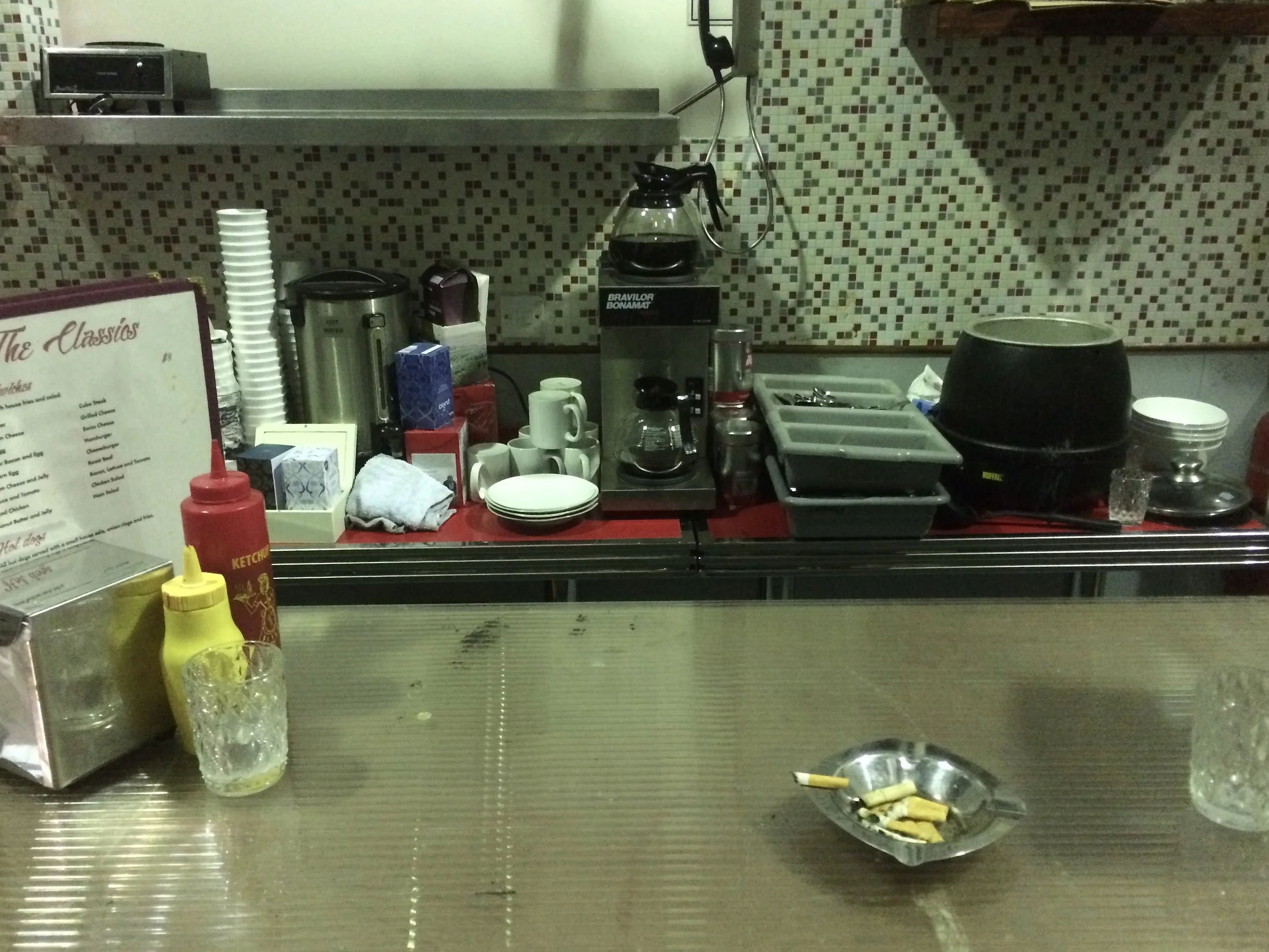‘INT. DINER - NIGHT’