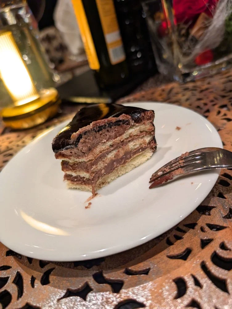 a layered chocolate cake on the AmaMagna
