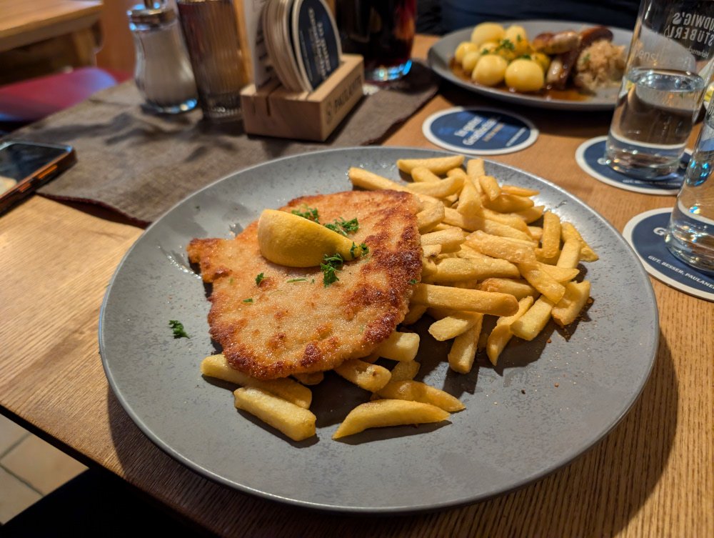 Schnitzel and Fries at Hotel & Restaurant Alpenstuben