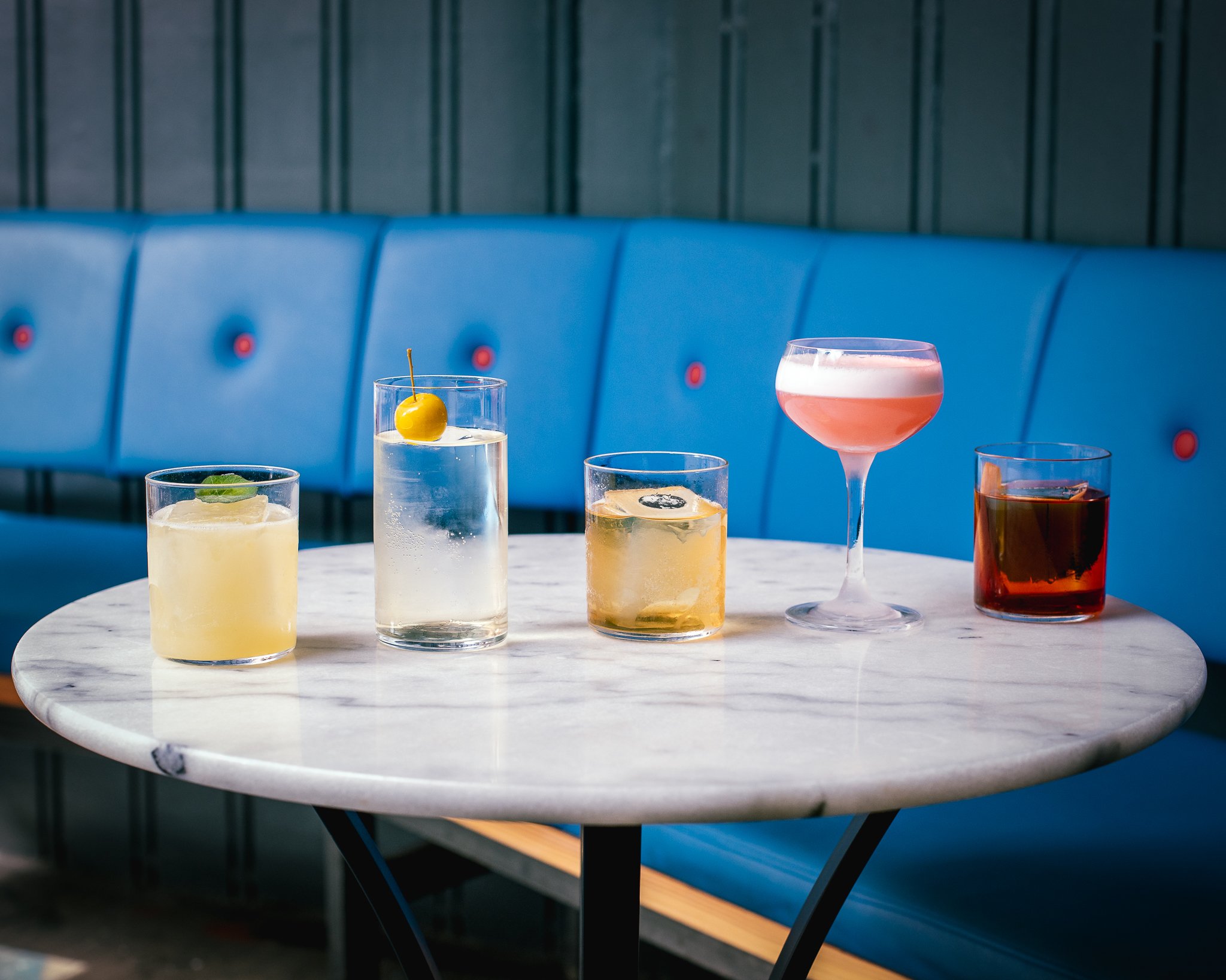 Selection of modern classic and Italian-inspired cocktails served at Hey Palu, an award-winning cocktail bar in Edinburgh.