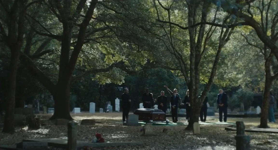 Ext. Funeral