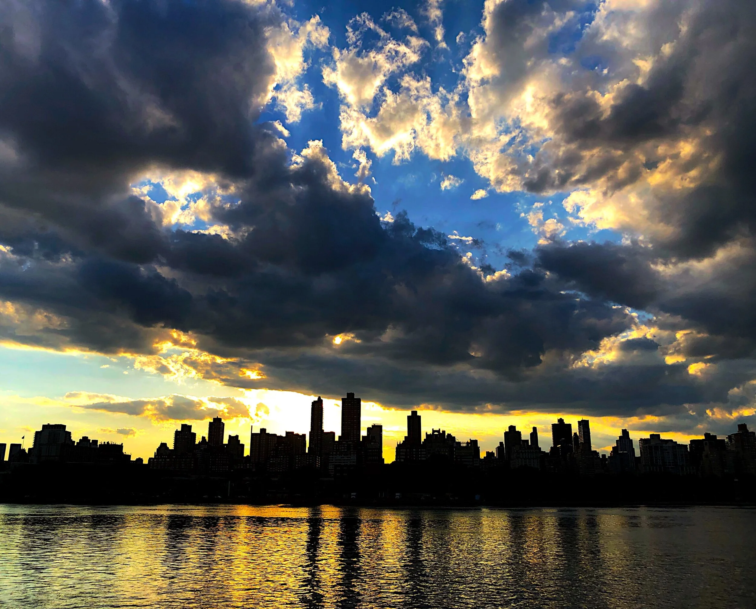 NYC skyline at sunset.