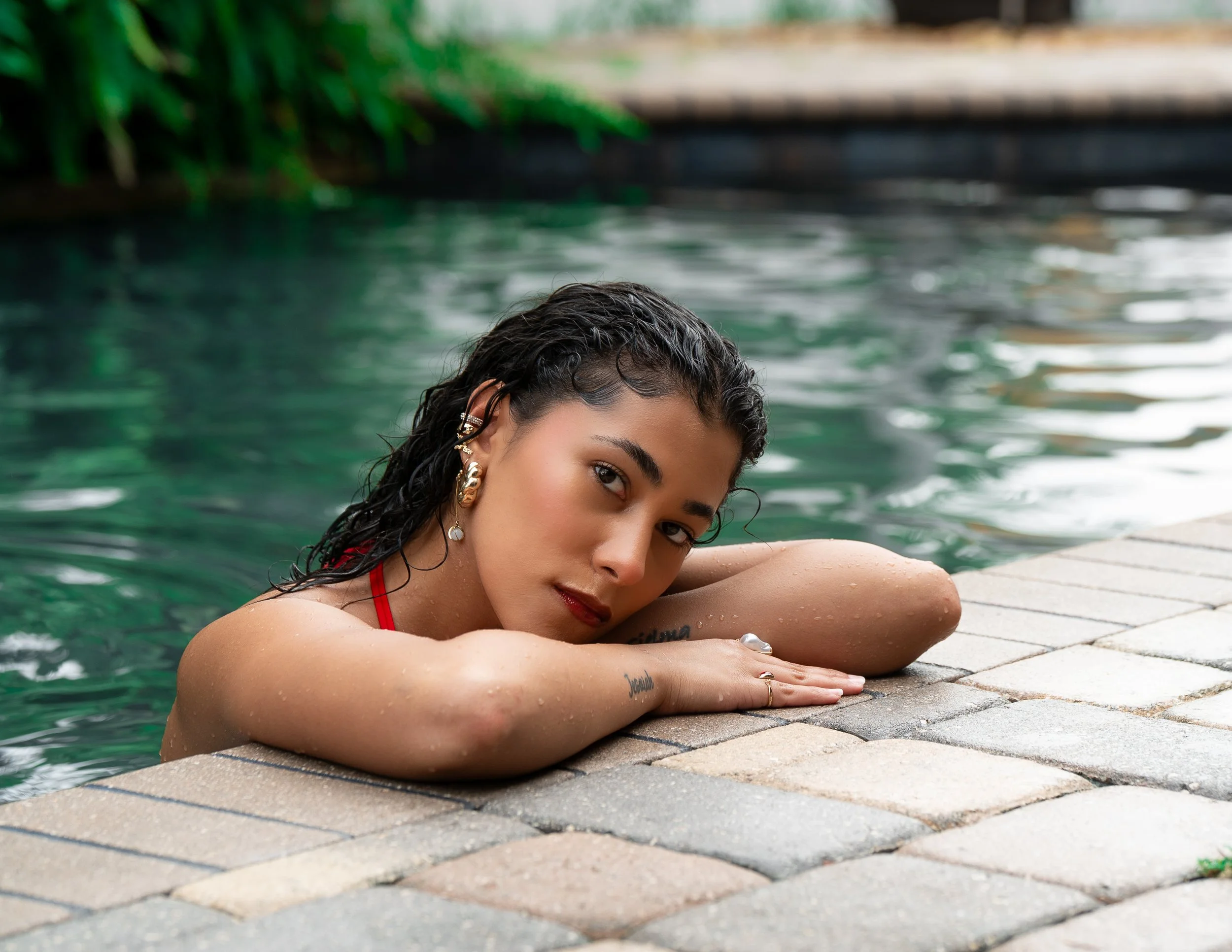 Sio half way out of the pool