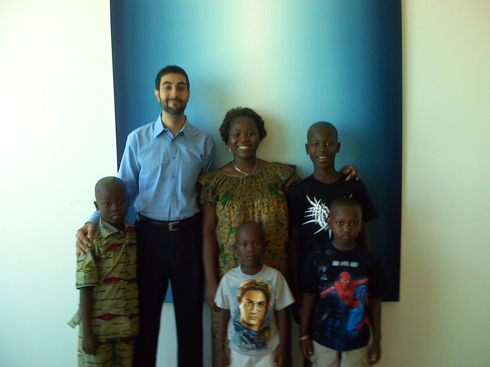 Shahid Haque, pictured with a family for whom he won political asylum.
