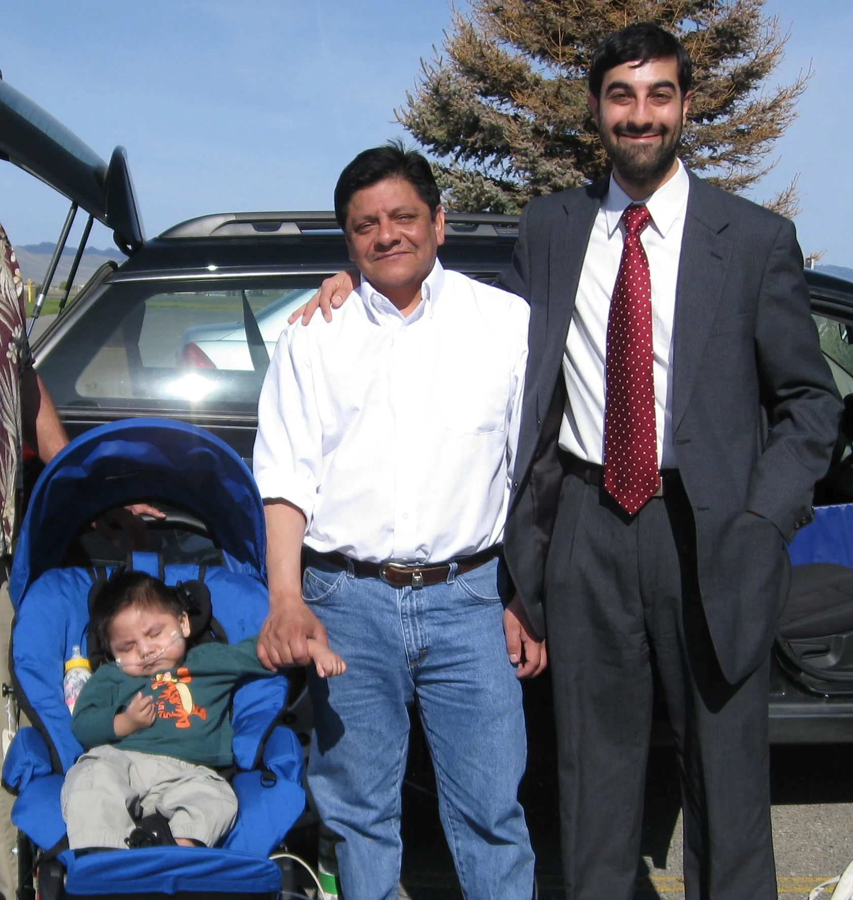 Shahid Haque, with a client for whom he won cancellation of removal in Immigration Court.