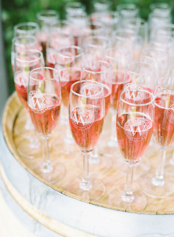 Tray of champagne glasses filled with Brut Rosé