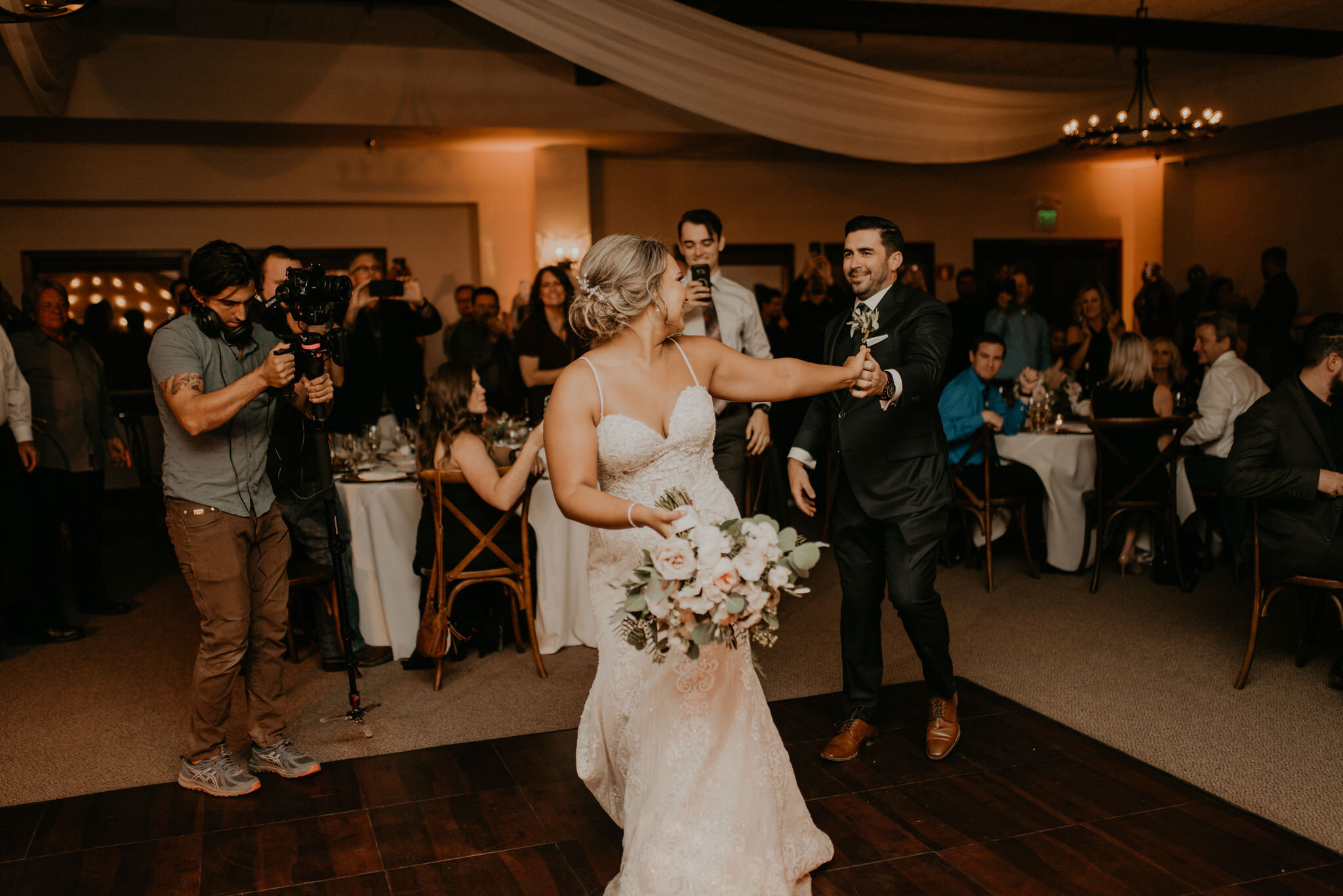 Bride &amp; groom on dance floor in Event Pavilion