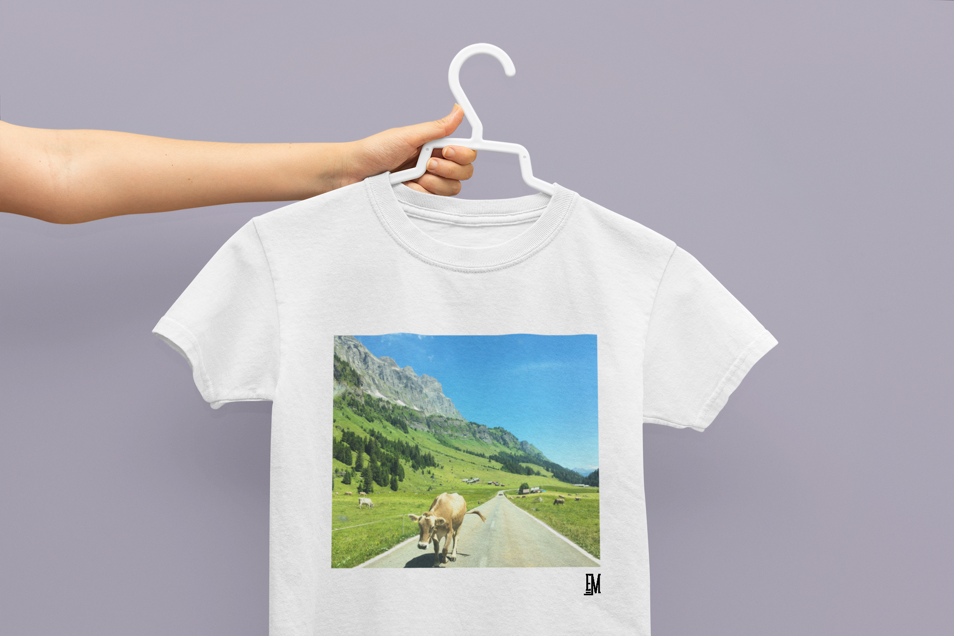 mockup-of-a-woman-holding-a-kids-t-shirt-33937.png