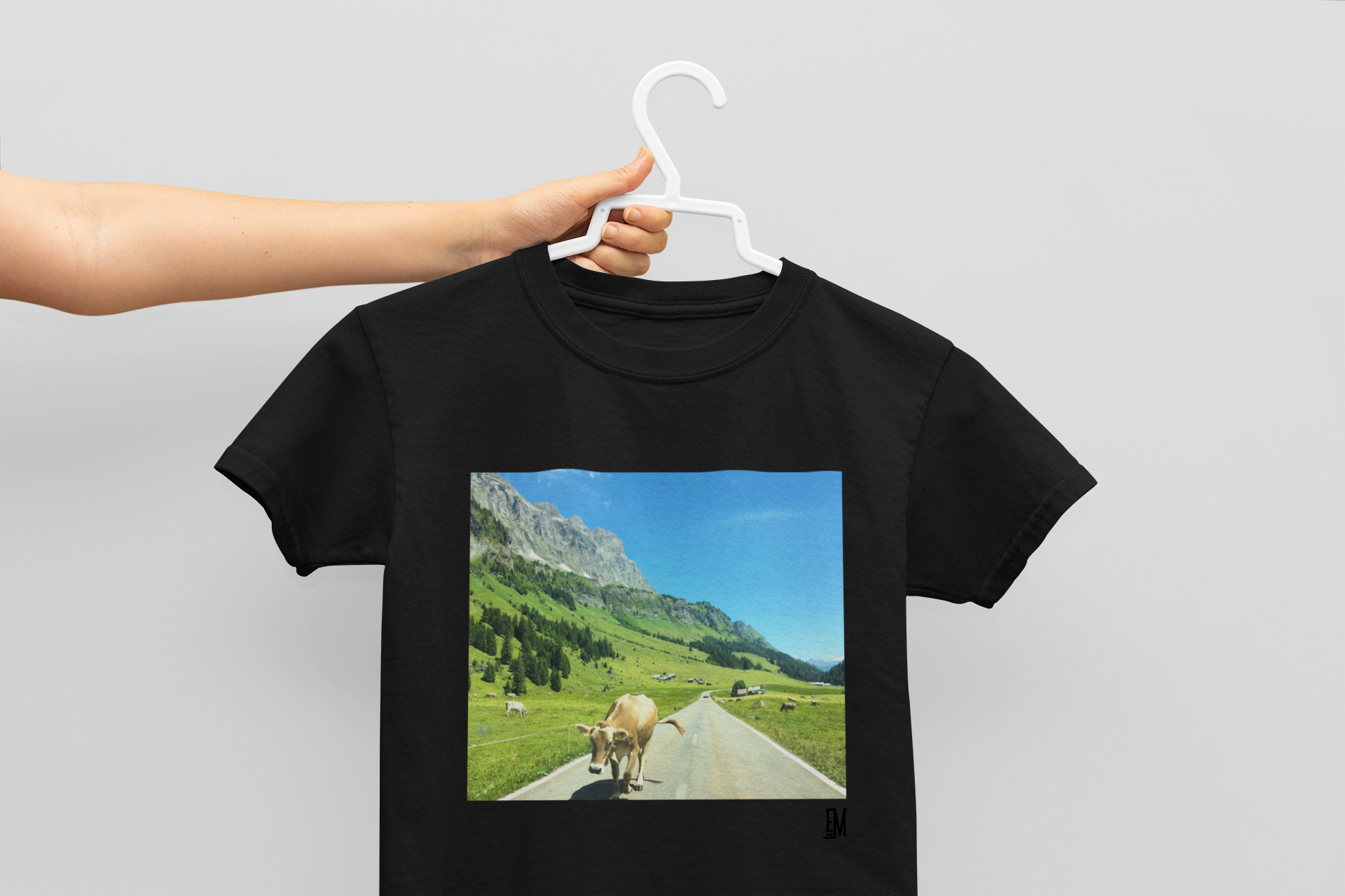 mockup-of-a-woman-holding-a-kids-t-shirt-33937-2.png