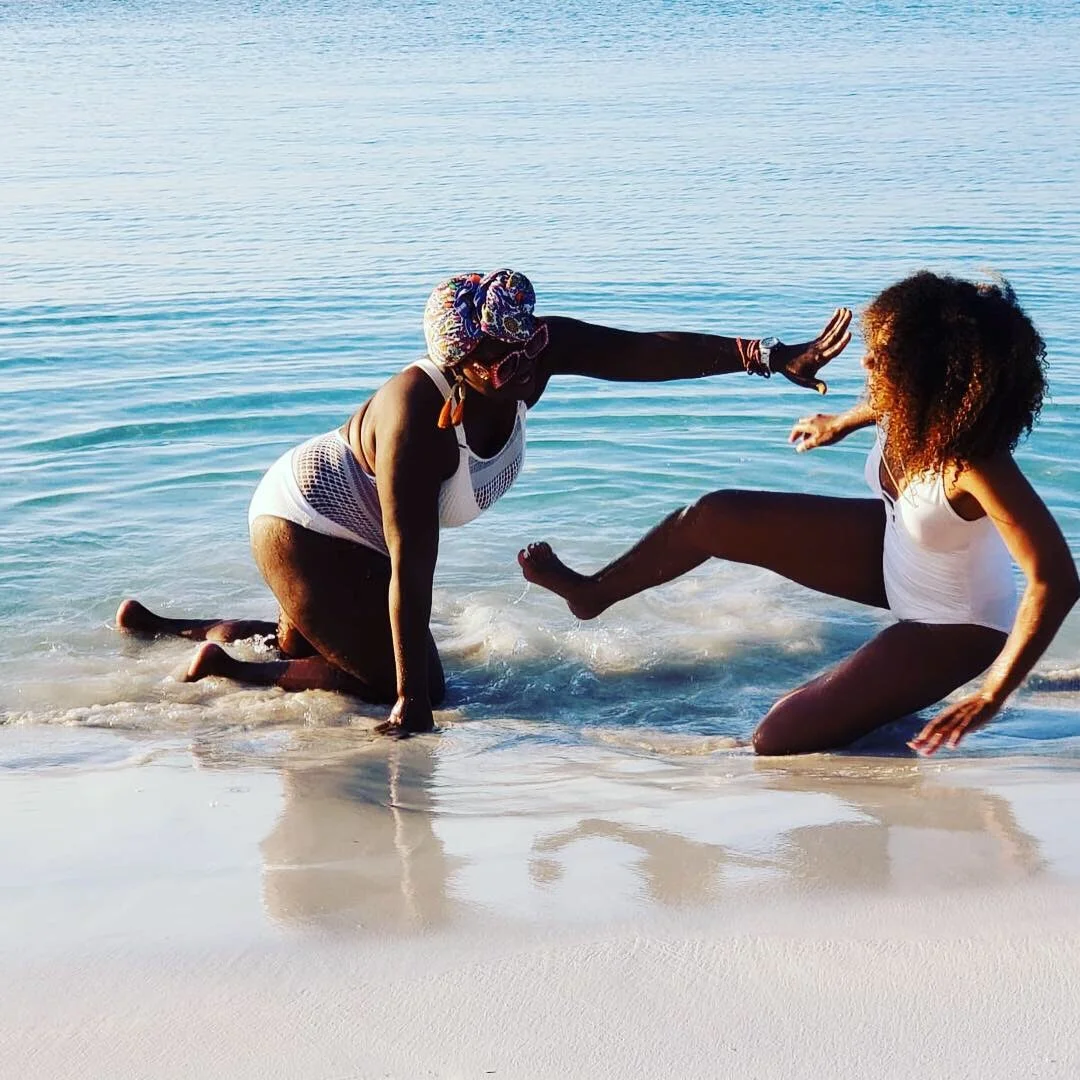friends playing in the water in the bahamas.jpg