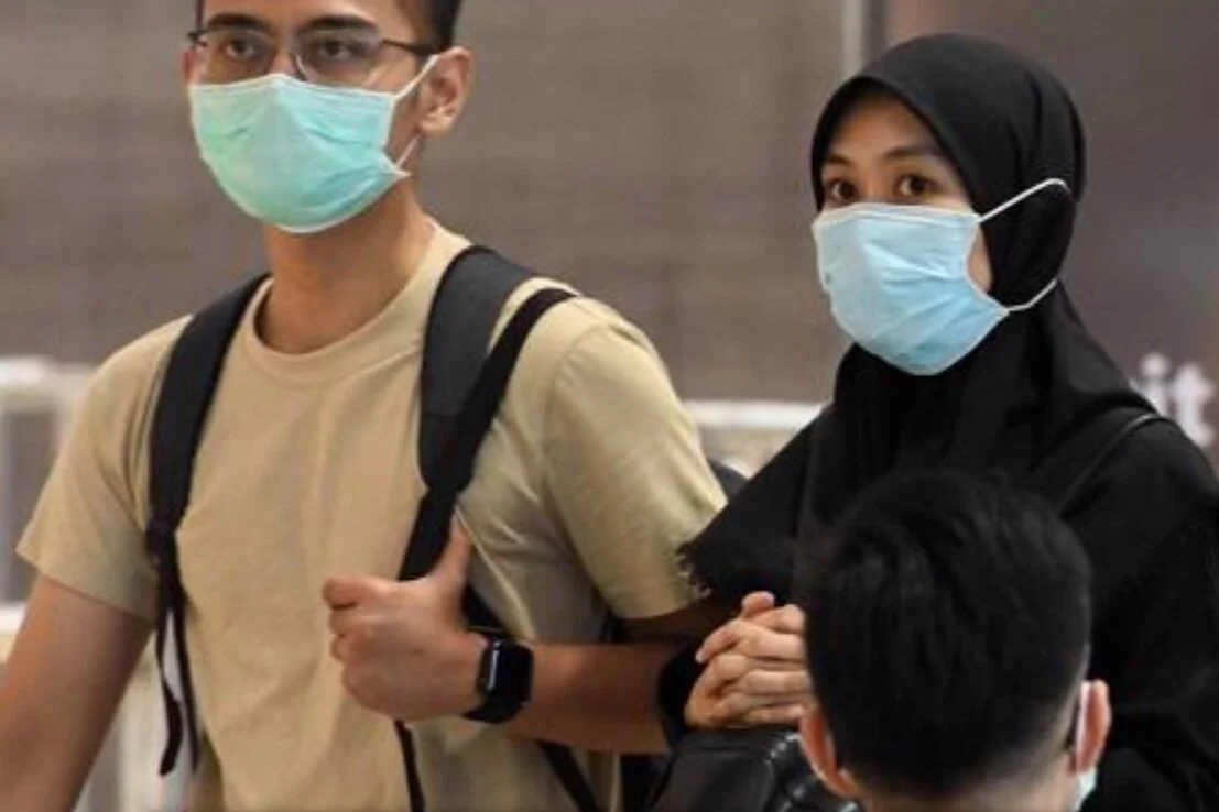 The East-West Divide in COVID-19 Control