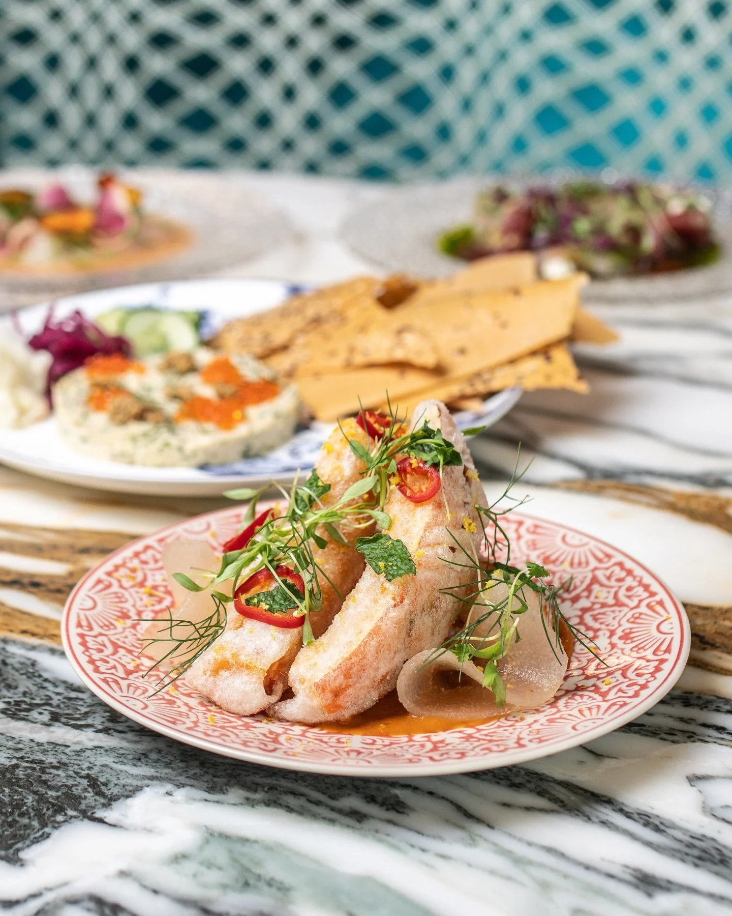 I could not be more excited about the amazing new lineup at @dinemarcusdc! Swipe and feast your eyes on our Tempura Squash, Roasted Drum Fish, Smoked Fish Plate, and Tamarind Braised Lamb Shoulder. Click link in bio to book a table!
