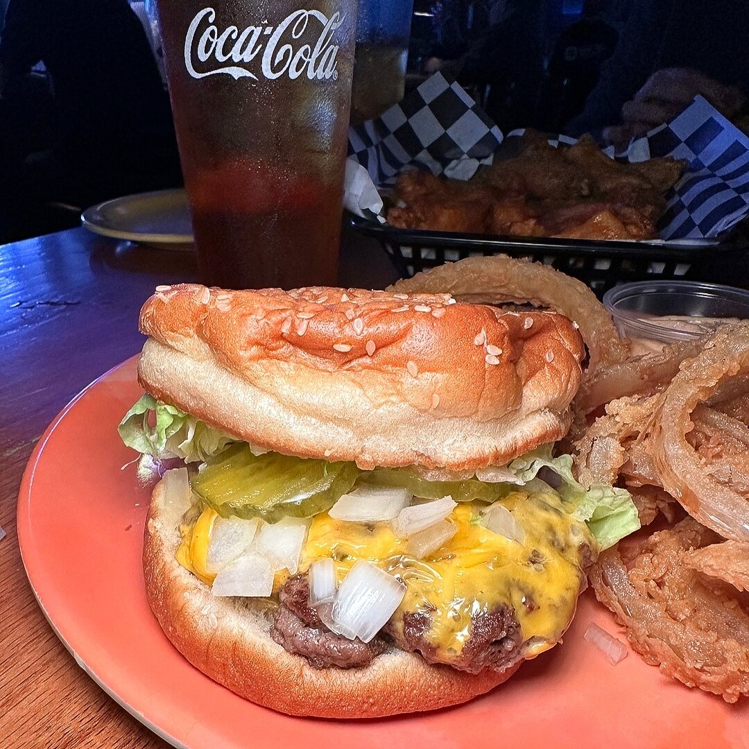 Travel Tuesdays: burgers from around the country 🌎 🍔⁣

The Harbor Island Burger from Katy's in Wilmington, NC! @katysgrillandbar 

An all original burger with mayo, pickle, onion, and American cheese on a squishy seeded bun accompanied by the best 