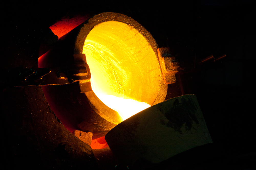 Molten gold pouring from the crucible