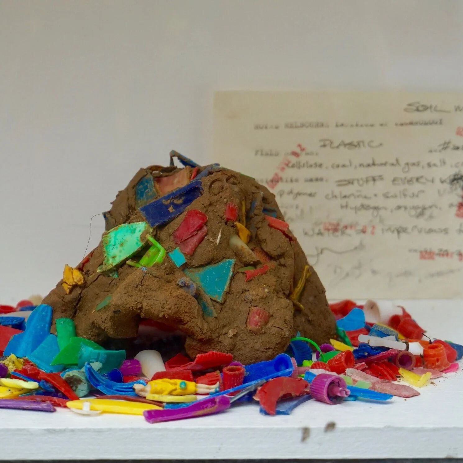The materials I use are sourced within 5km of my home, plastics washed up amongst the shells on the shore of Elwood Beach, food that has travelled distances to arrive in my 5 km radius. Some species of termite mix faeces to the soil or bio matter,