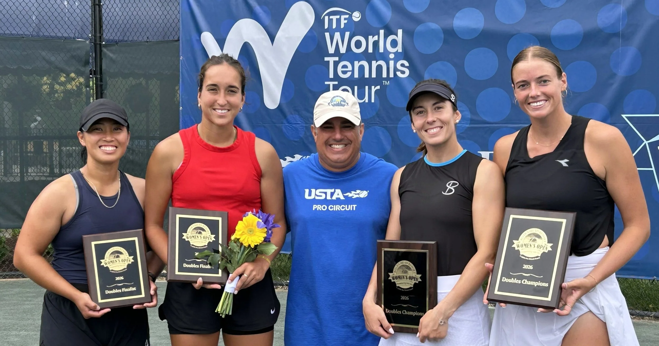 Competitive tennis players after doubles final match representing high performance tennis environment and mental performance coaching context