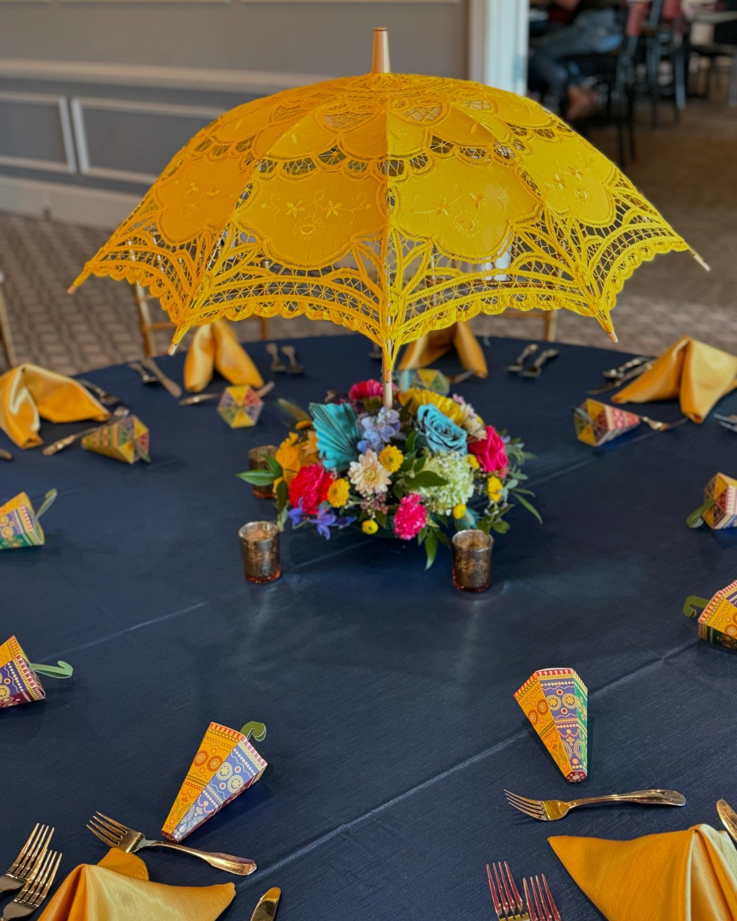 Another colorful and beautiful event with @divineinspirationsinc this weekend!! They really know how to pull together a design. Our first time making umbrella arrangements!