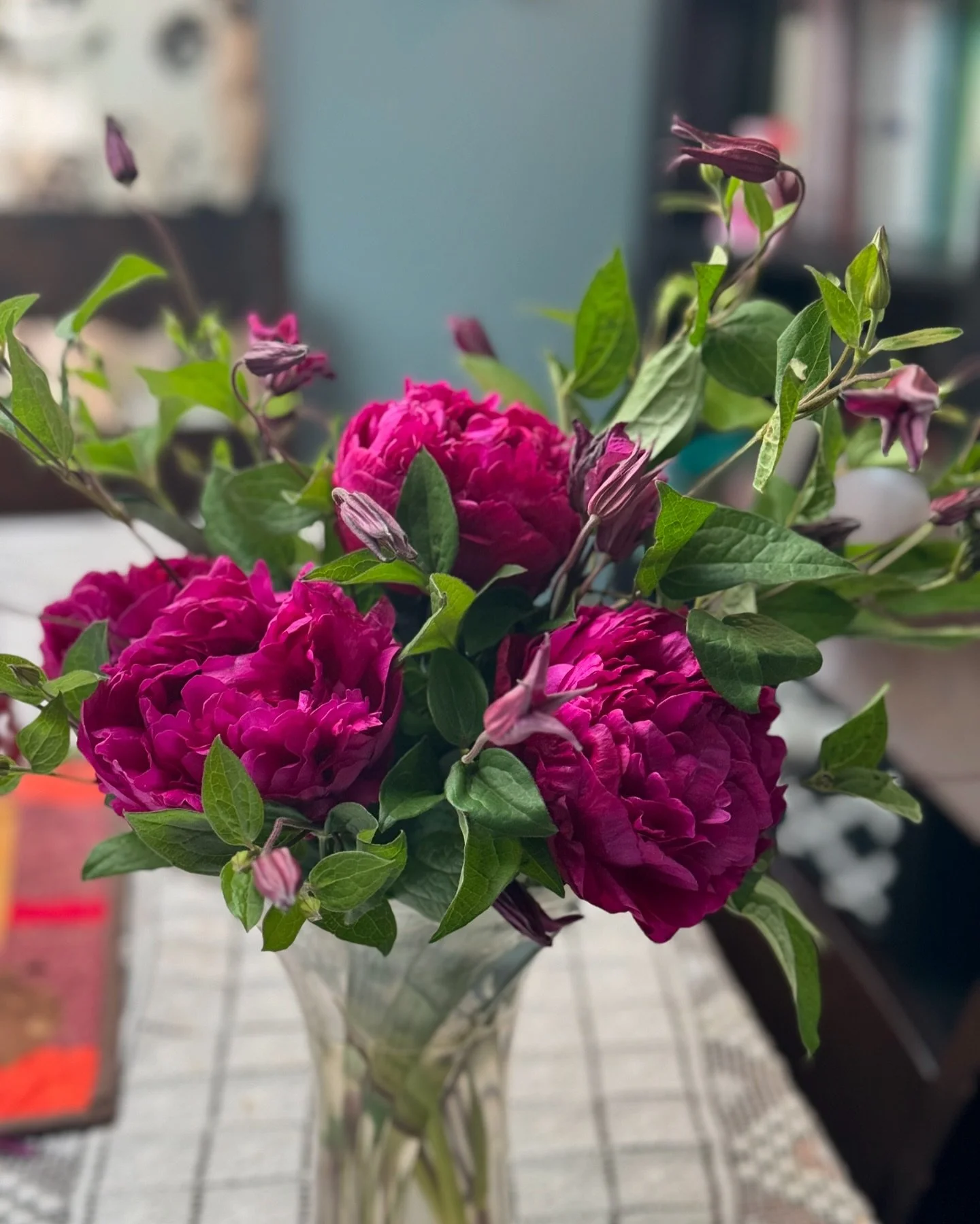 The local produce store had peonies and clematis! Pretty spring flowers for me. ~ Amy