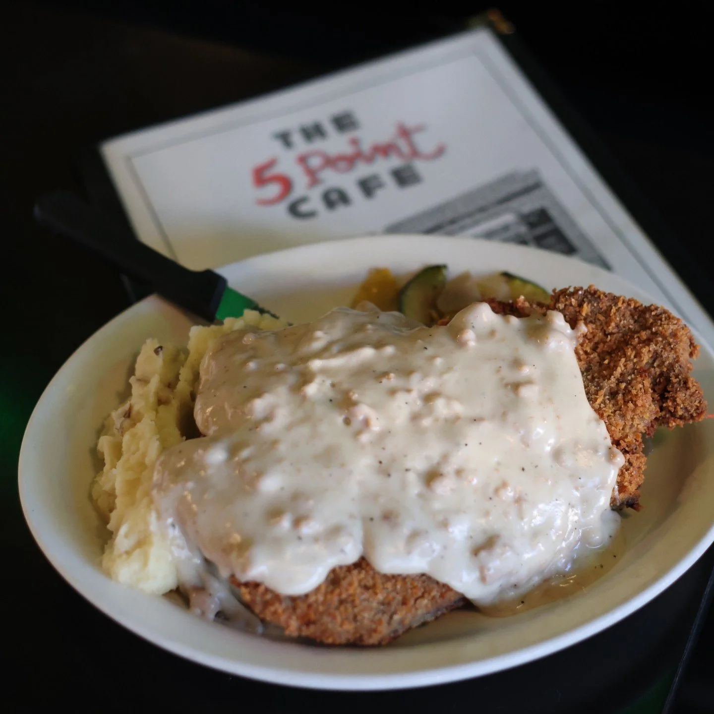 Yeah, we&rsquo;ve got the biggest Chicken Fried Steak in Seattle. Obviously!

We pound the crap out of a beef steak to make it ever so tender, batter it like a southerner would chicken, crisp it to a perfect oblivion and drown it in a country sausage