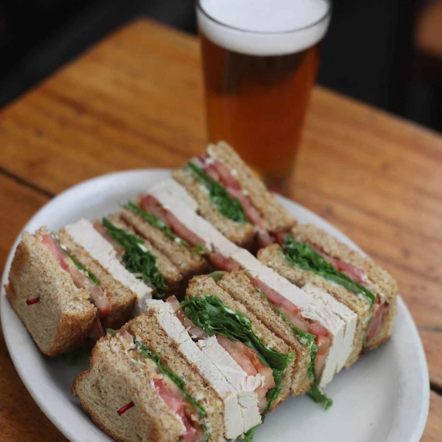 You don't expect a 24-hour joint with a jukebox this loud to have a sandwich this fresh, but here we are. Our Turkey Club is the sleeper hit of Belltown. Perfectly balanced, dangerously delicious, and most commonly enjoyed with a delicious beer on ta