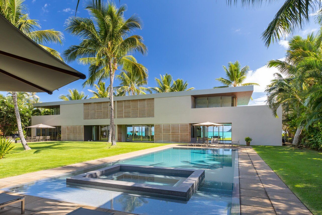    San Francisco-based architect Jim Jennings designed a modern  7,465-square-foot home of plaster walls, lattice teak screens and  brushed stainless steel near Lanikai Beach on the Hawaiian Island of  Oahu. Landscape designer Wendy Harper designed t