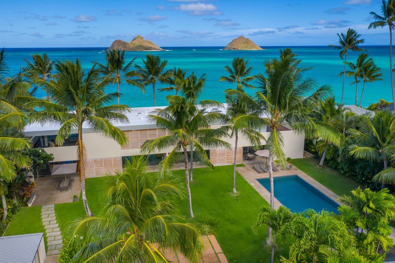  Poured pavers throughout the landscape are made of basalt and coral that was found on the property and repurposed.  Hiep Nguyen/Slick Pixels Hawaii 