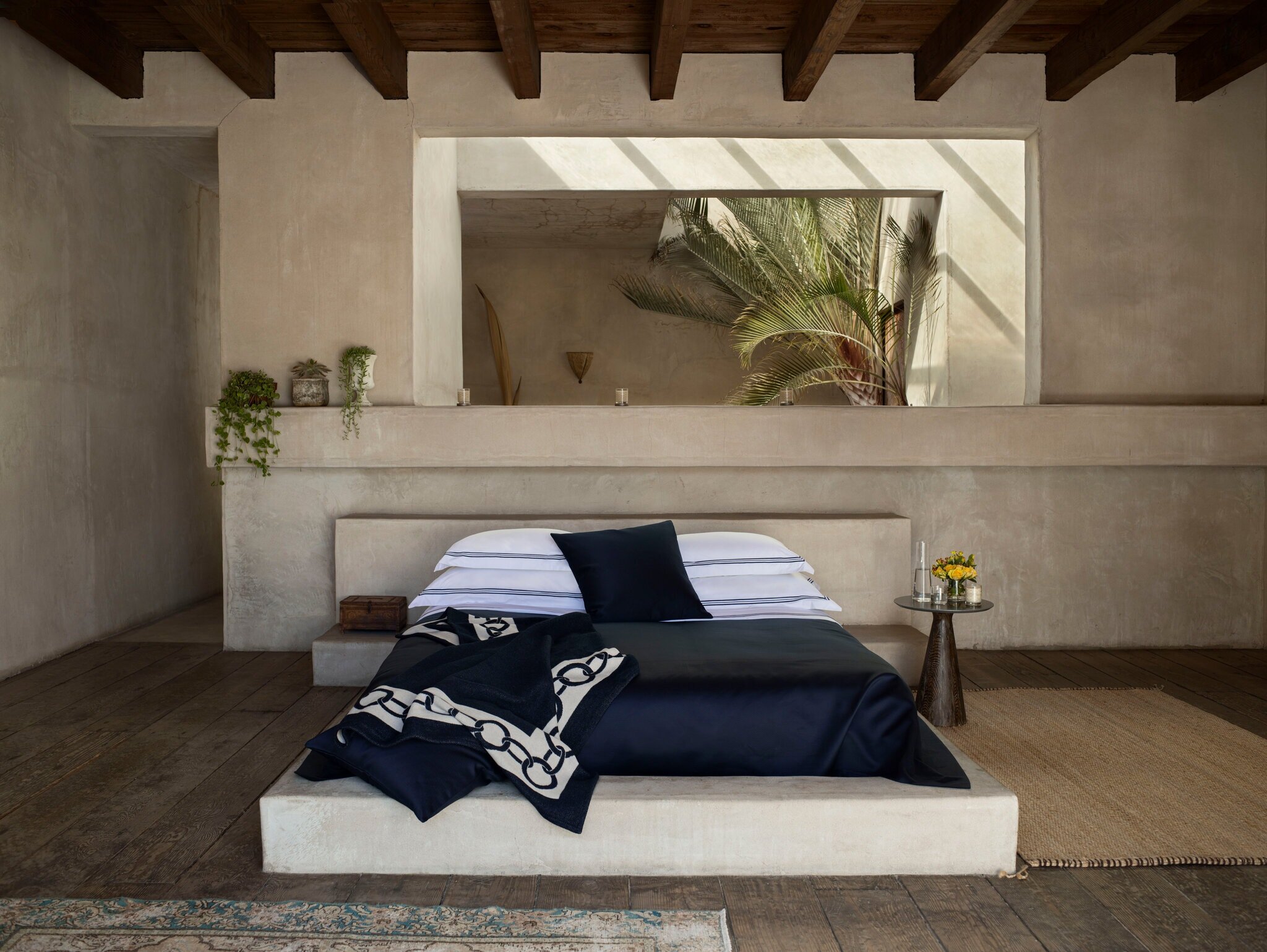  A bed styled by Frette shows a simple way to deal with pillows: Place a single decorative pillow in front of four stacked pillows used for sleeping. Credit Courtesy of Frette 
