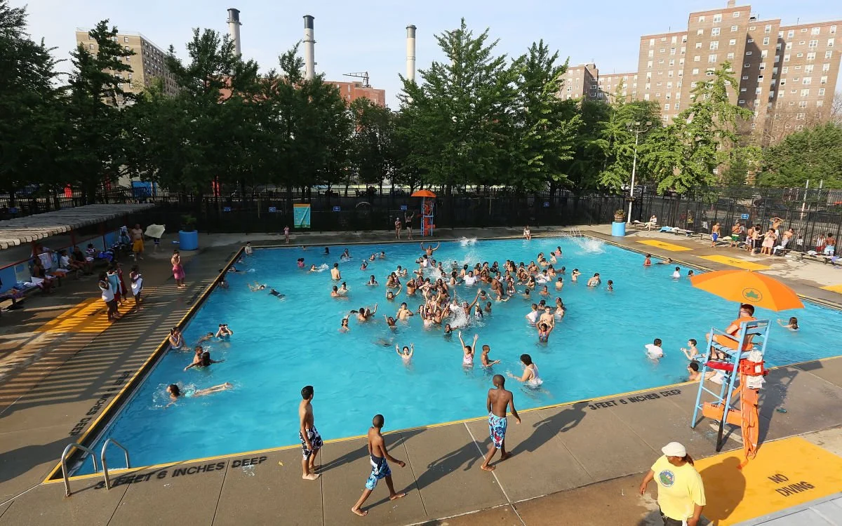 aerial view of populated NYC public pool