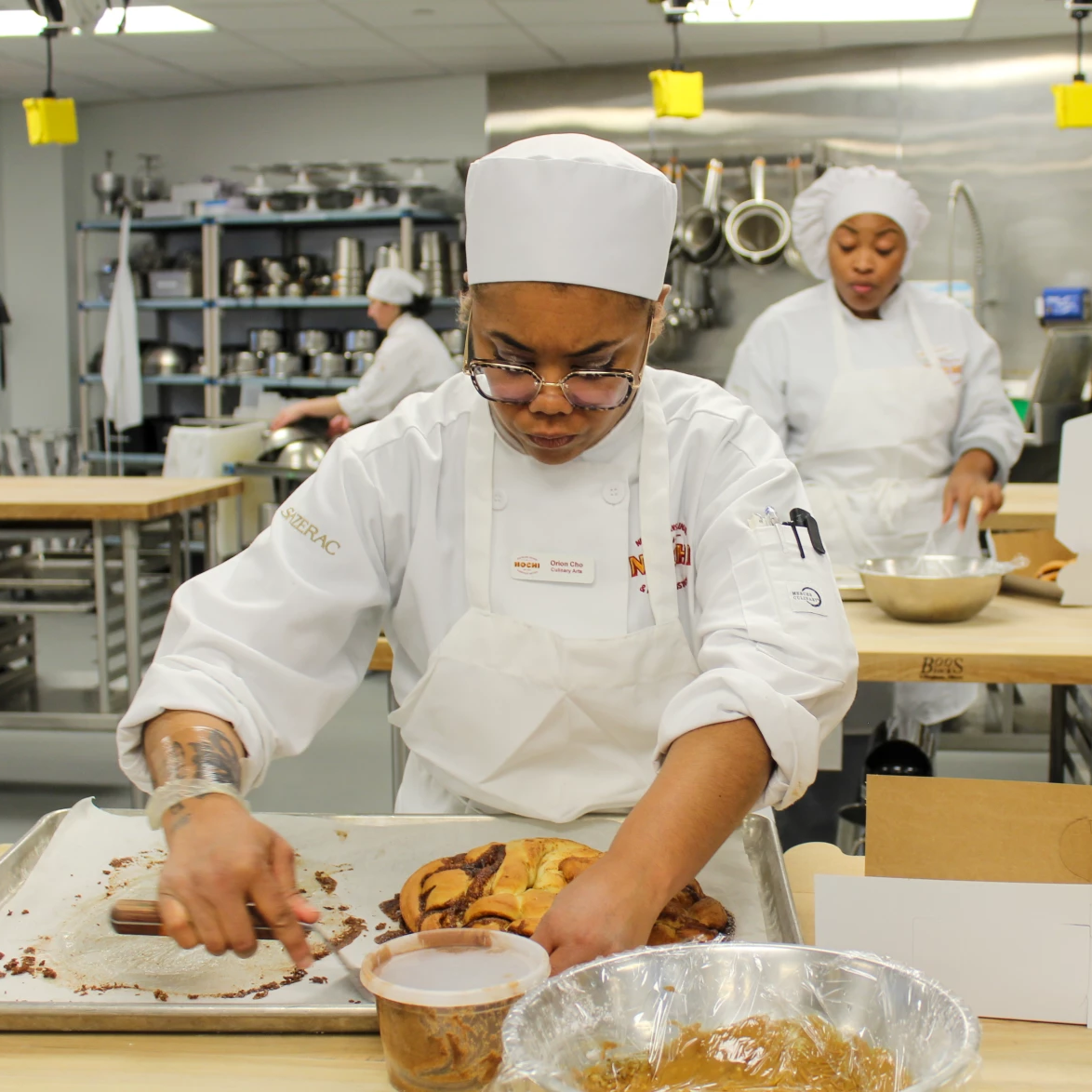 At NOCHI, students learn the art of making a Mardi Gras-worthy king cake