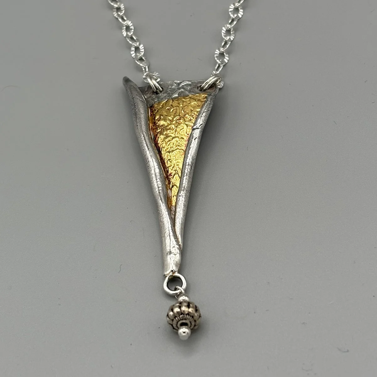 KB Scroll Pendant w silver bead.jpg