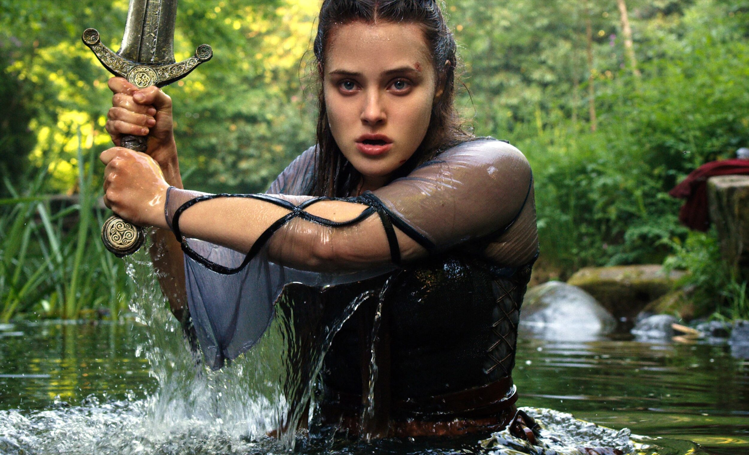 Cursed focuses on Nimue, before she becomes the watery tart known as the  Lady of the Lake, here she wields Excalibur.