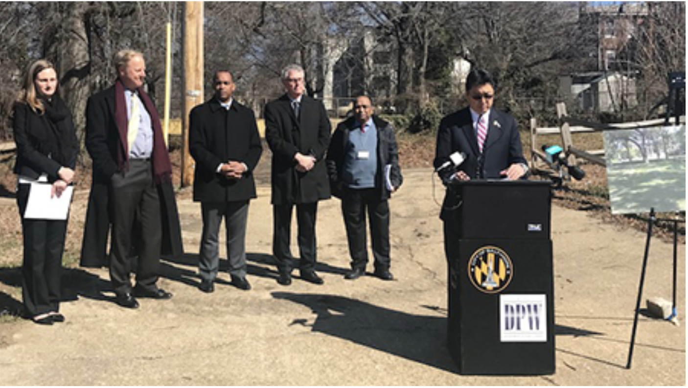 Department of Public Works Director Rudy Chow at podium.