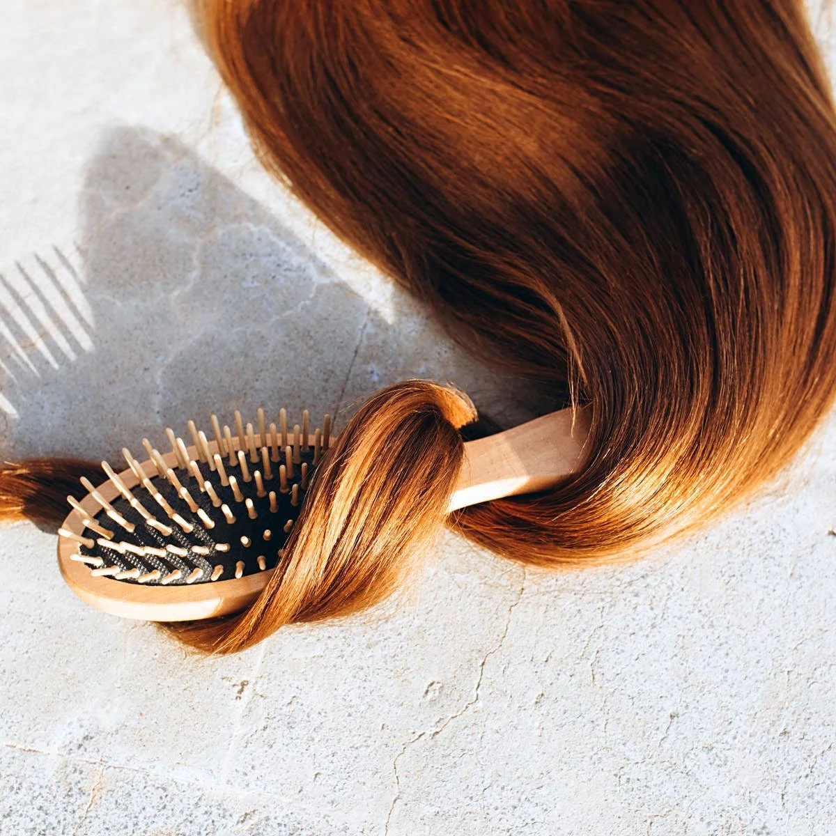 Healthy, smooth, shiny hair after Brazilian Blowout smoothing treatment for frizz control and easier styling.