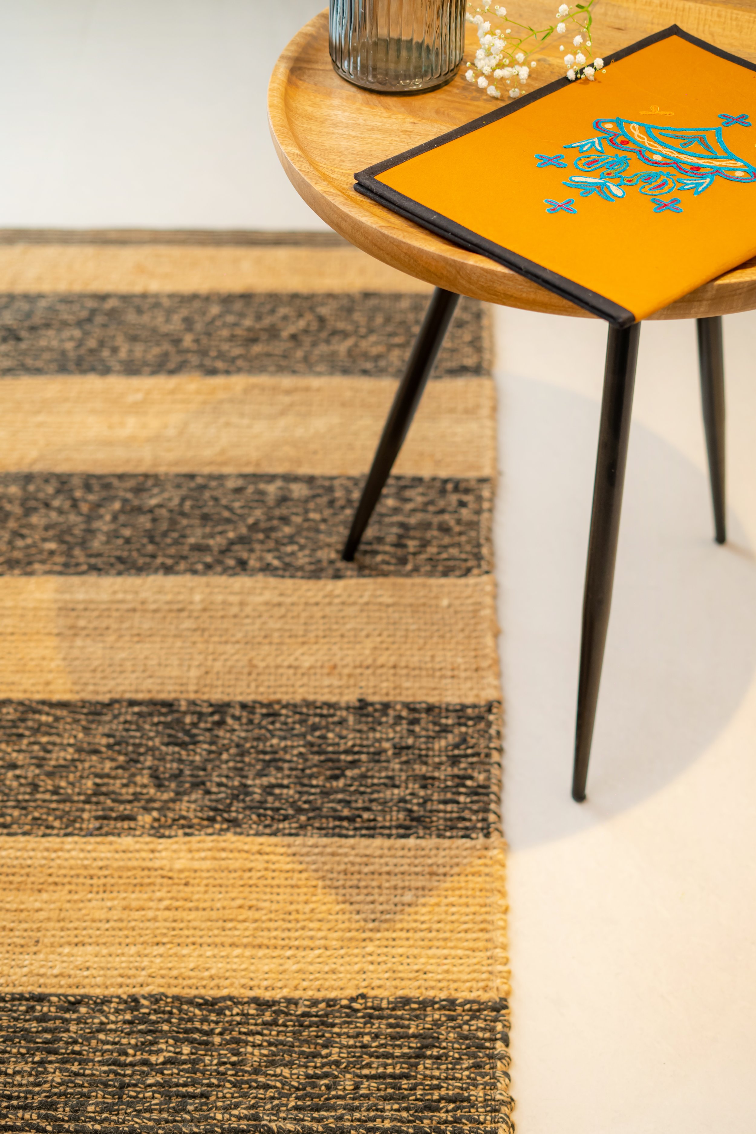 Nuetral rug and Wooden end table