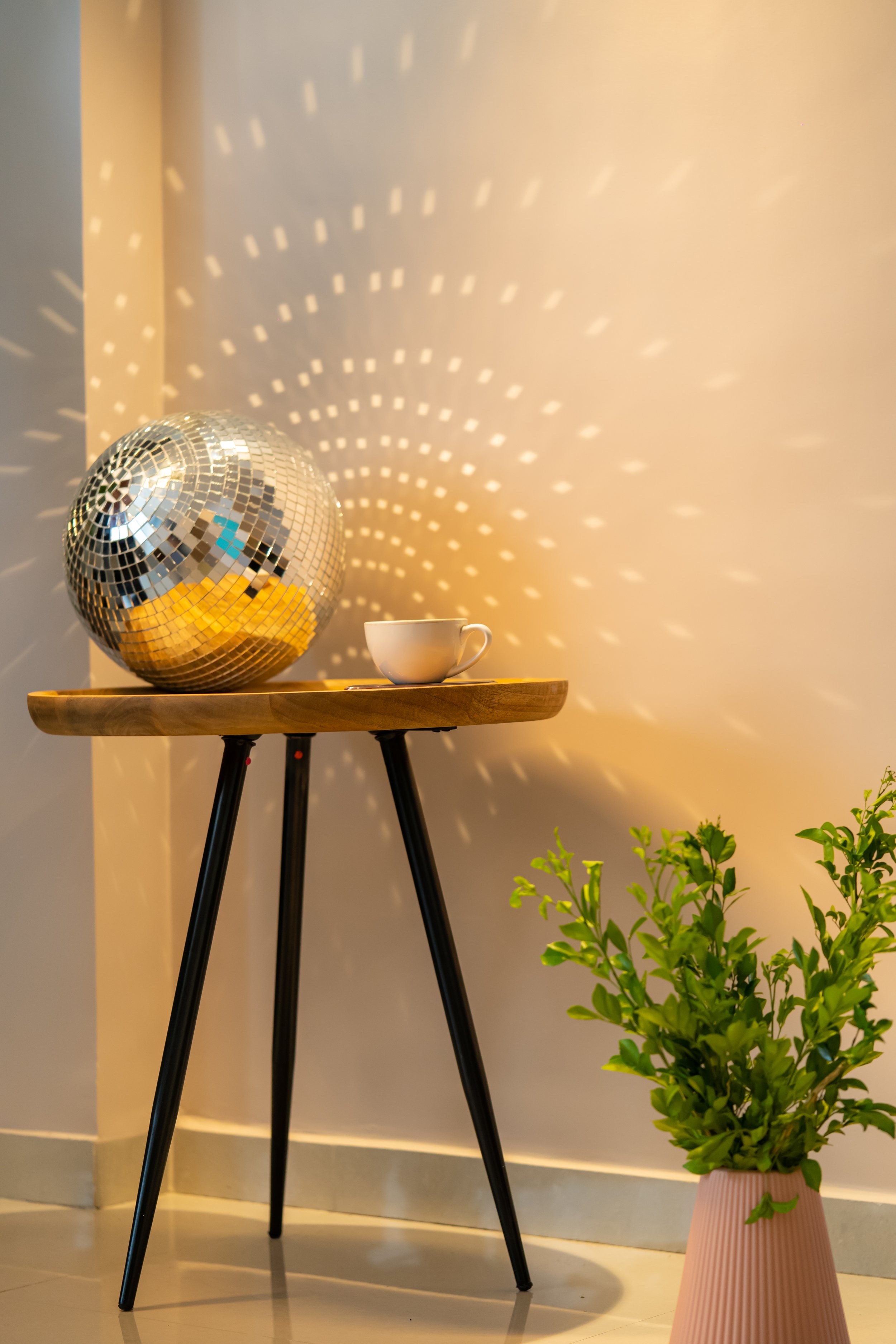 Disco ball and wooden end table