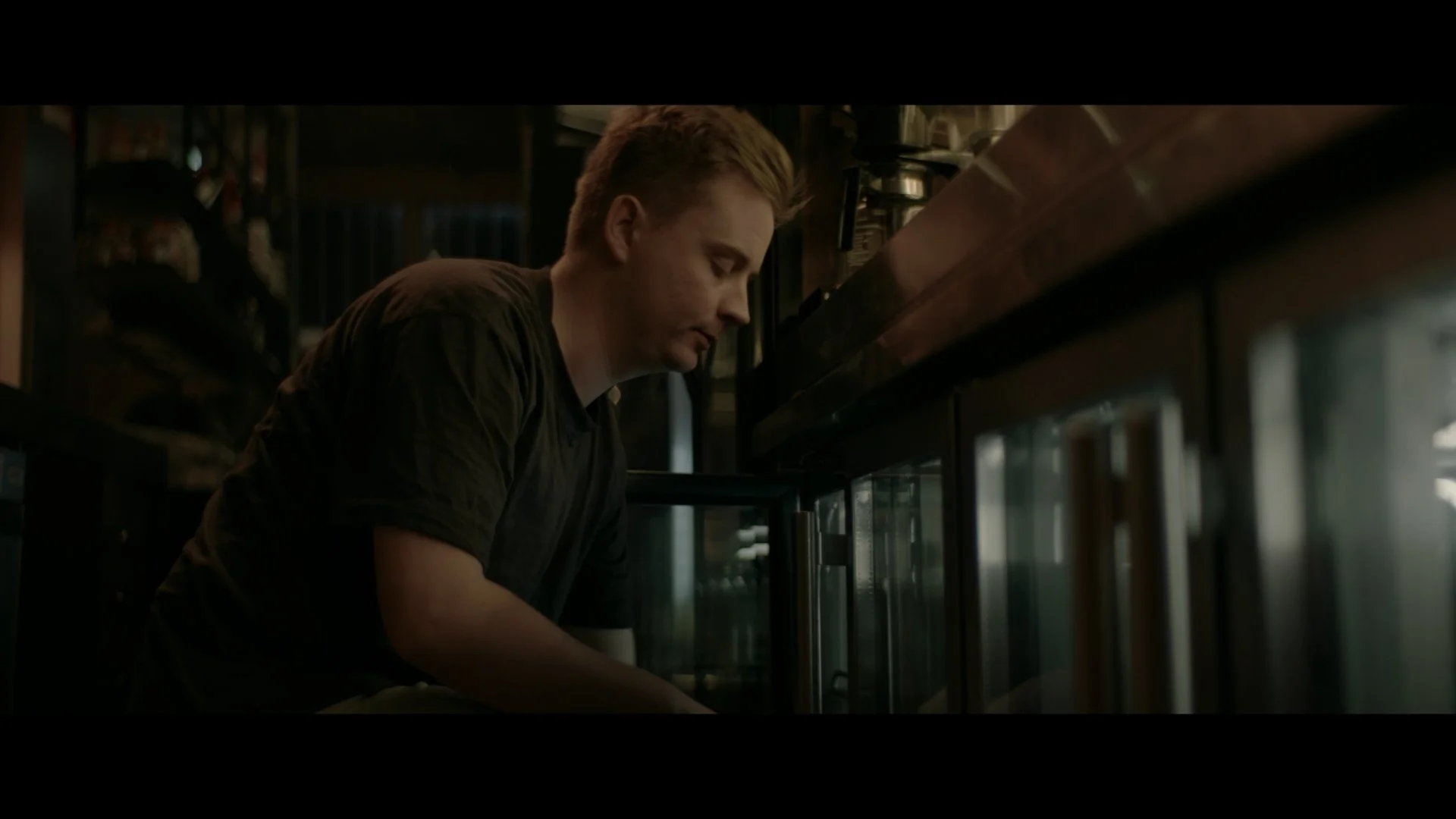 bartender grabs beer from fridge_1.1.3.jpg