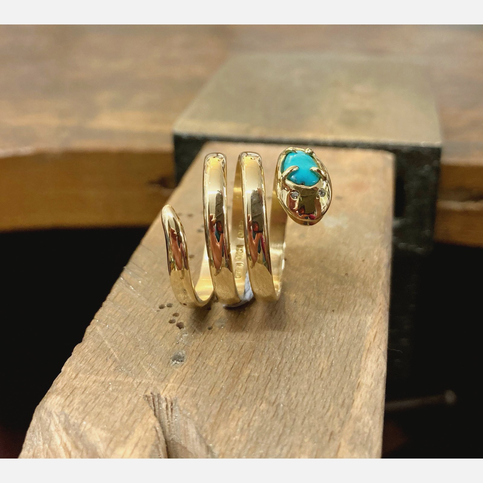 Re-clawing in an 18ct yellow gold, turquoise and diamond Snake ring
