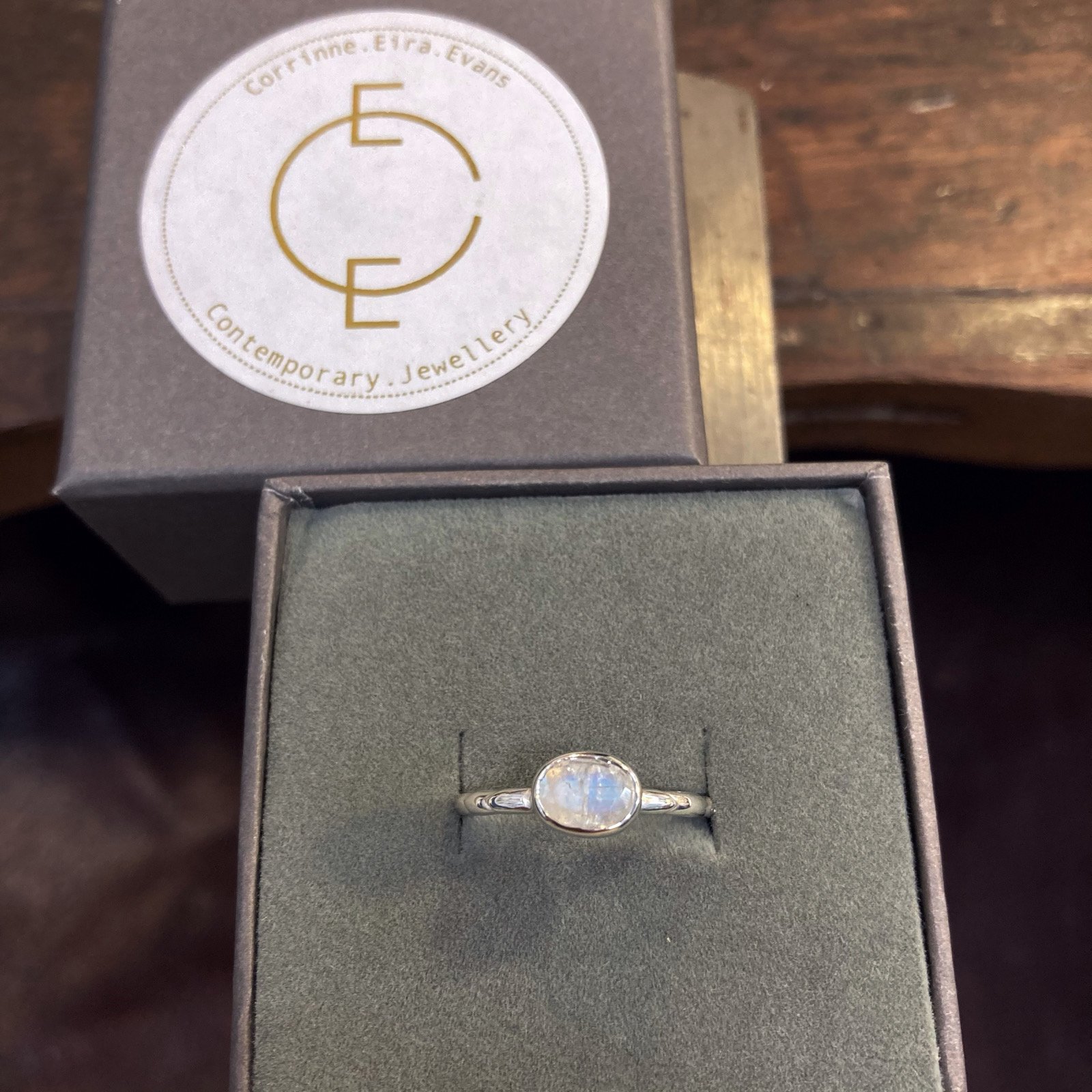 Bespoke made rainbow moonstone ring with hand carved 'Feather' design.