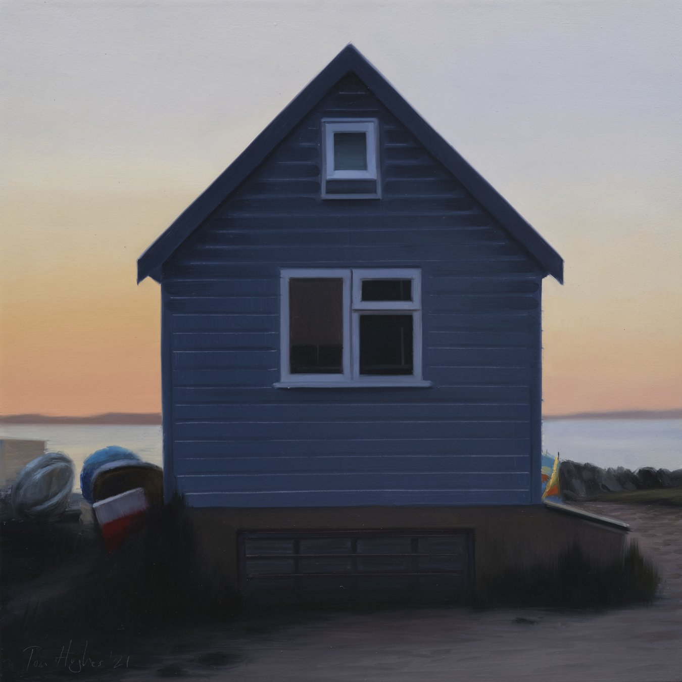 Back-lit blue hut with windbreaker