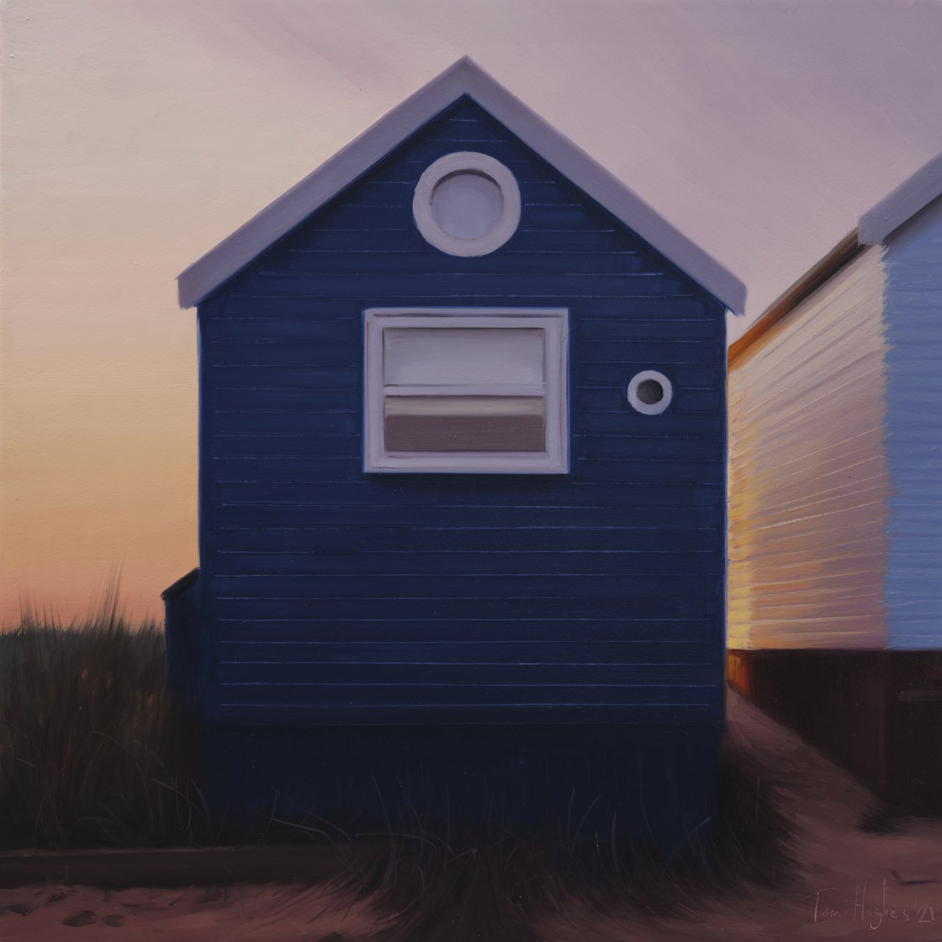  Back-lit dark blue hut, warm light