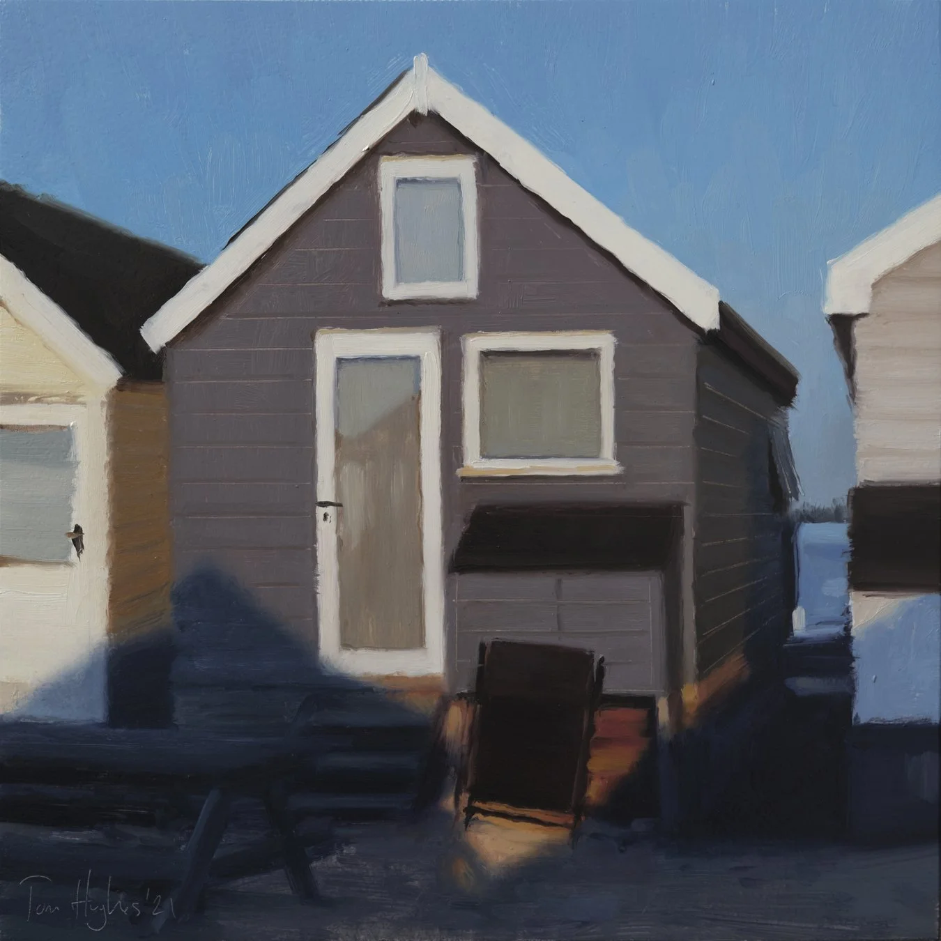 Grey hut, sunlit folding chair.jpg