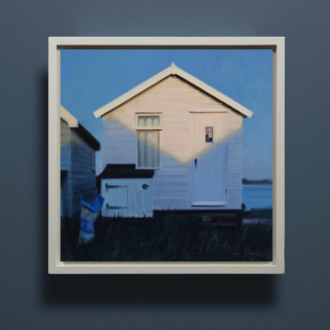 White hut with blue windbreaker