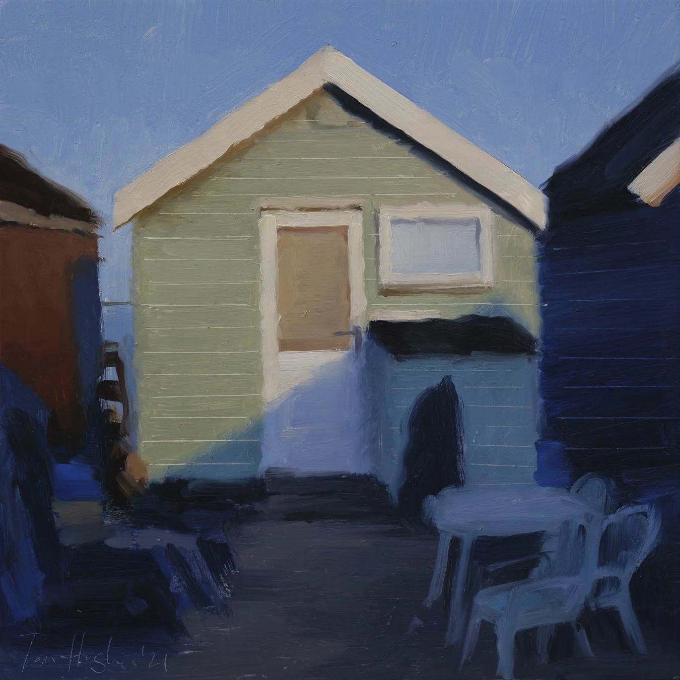 Green hut with table and chairs.jpg